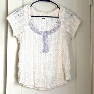 Free people cream top with cap sleeves and details. Size L